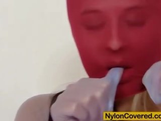 Incredible blonde red spandex mask on her face