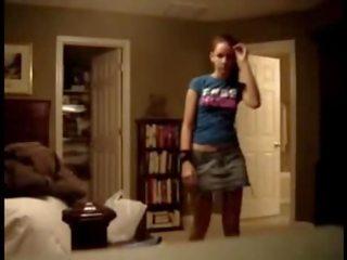 Spycam Records young woman In Jeans Skirt Stripping