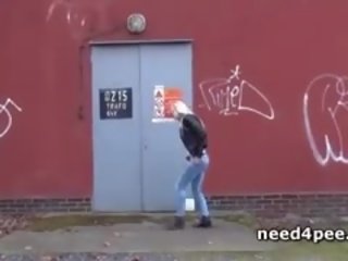 Amateur teenager Hides Behind A Wall To Take A Pee