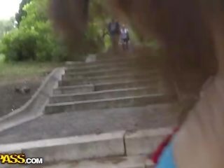 Young stunner movs her tits in a public streets clip