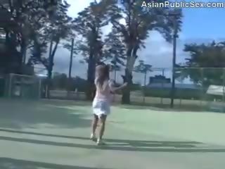 Asiática tenis corte público adulto presilla