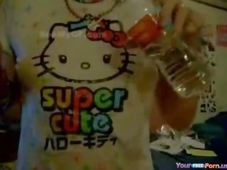 Alluring Japanese schoolgirl With Wet Hello Kitty T-Shirt